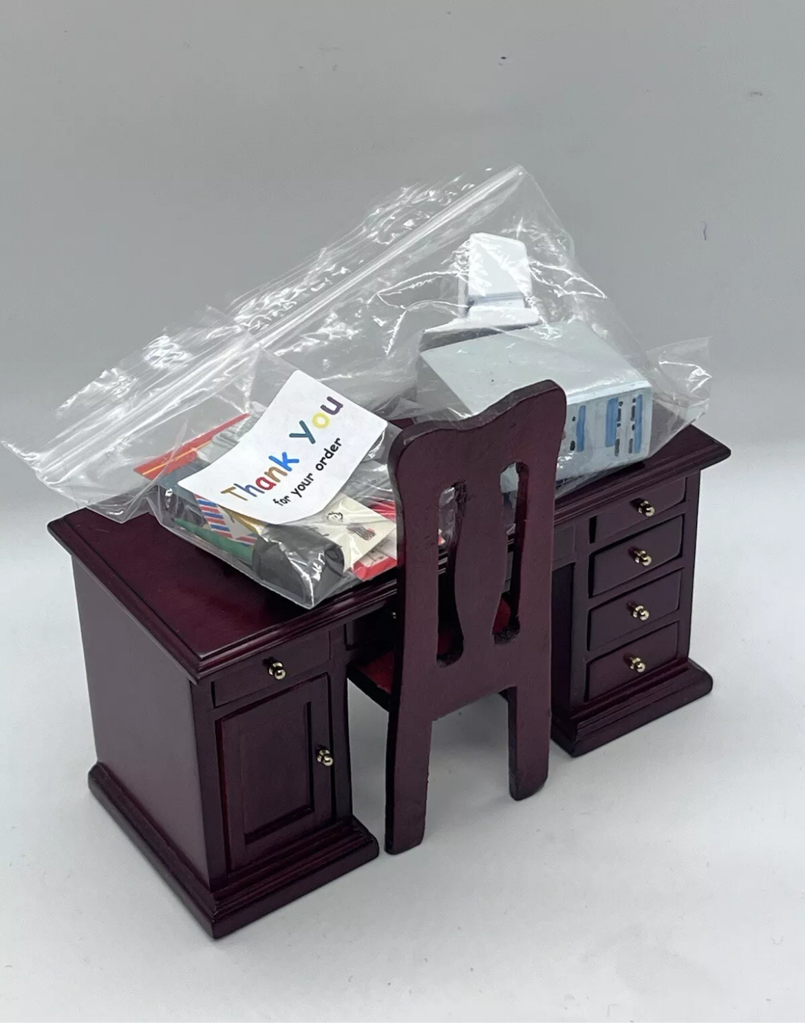 Dolls house desk, chair & all accessories.