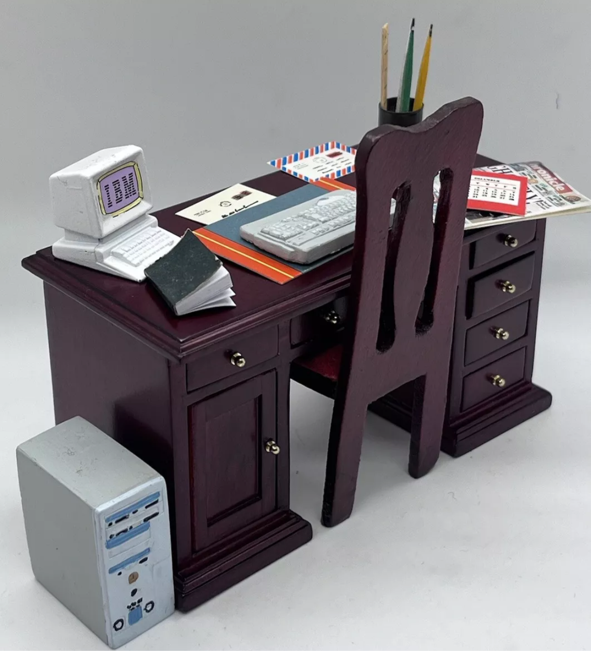 Dolls house desk, chair & all accessories.