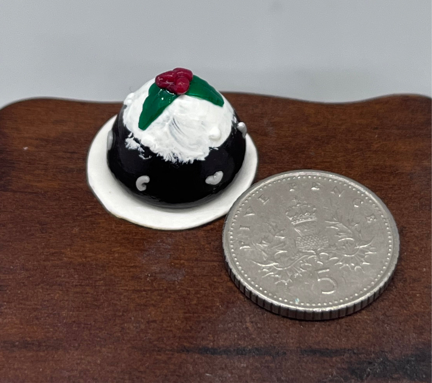 Dolls house Christmas pudding on paper plate