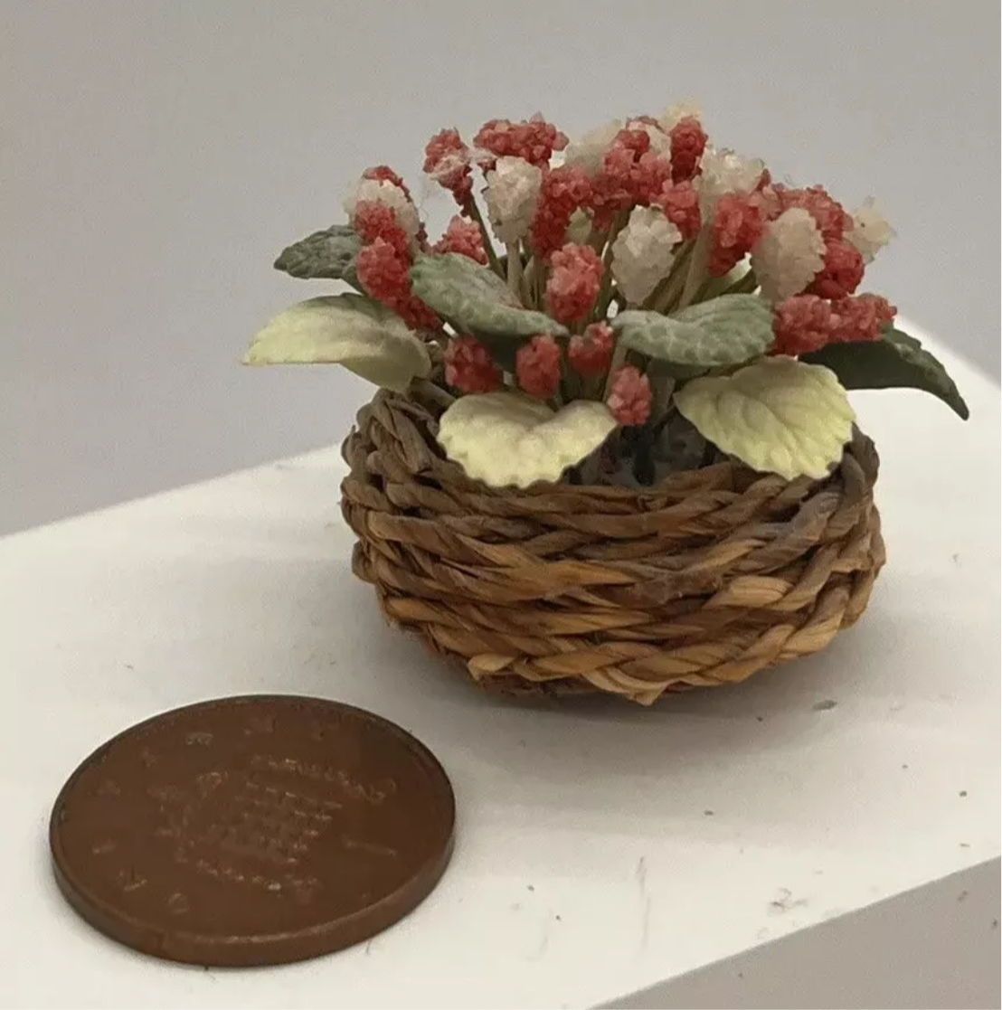 Dolls house flowers in basket
