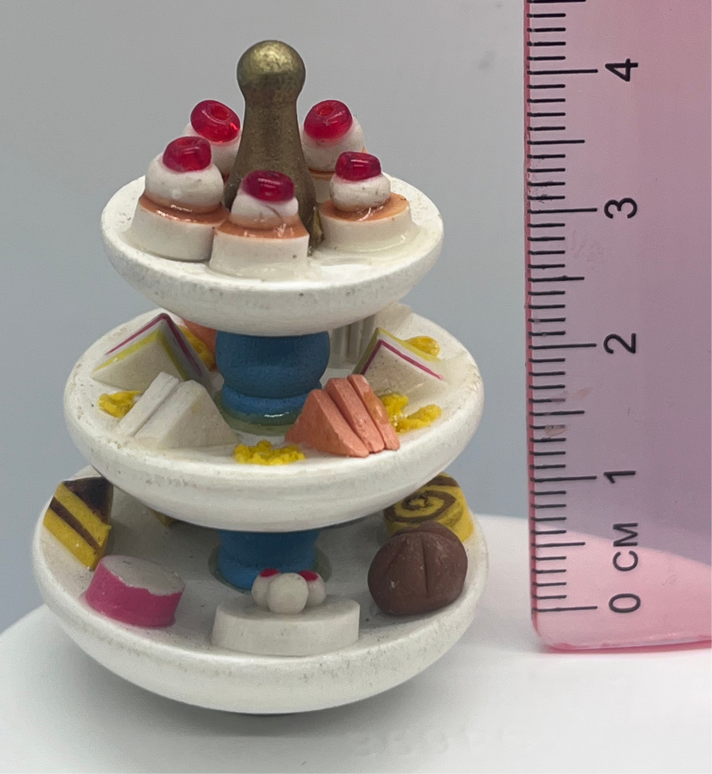 Dolls house triple wooden cake stand and cakes