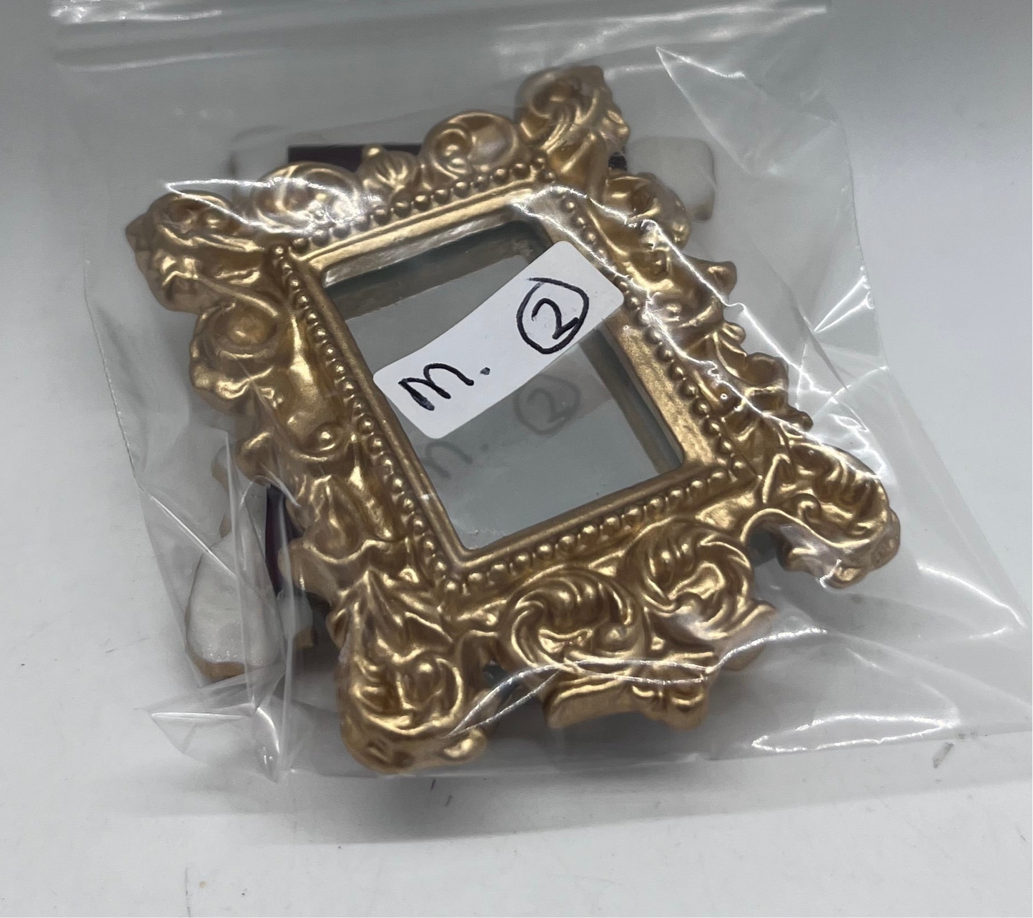 Dolls house metal framed ornate mirror