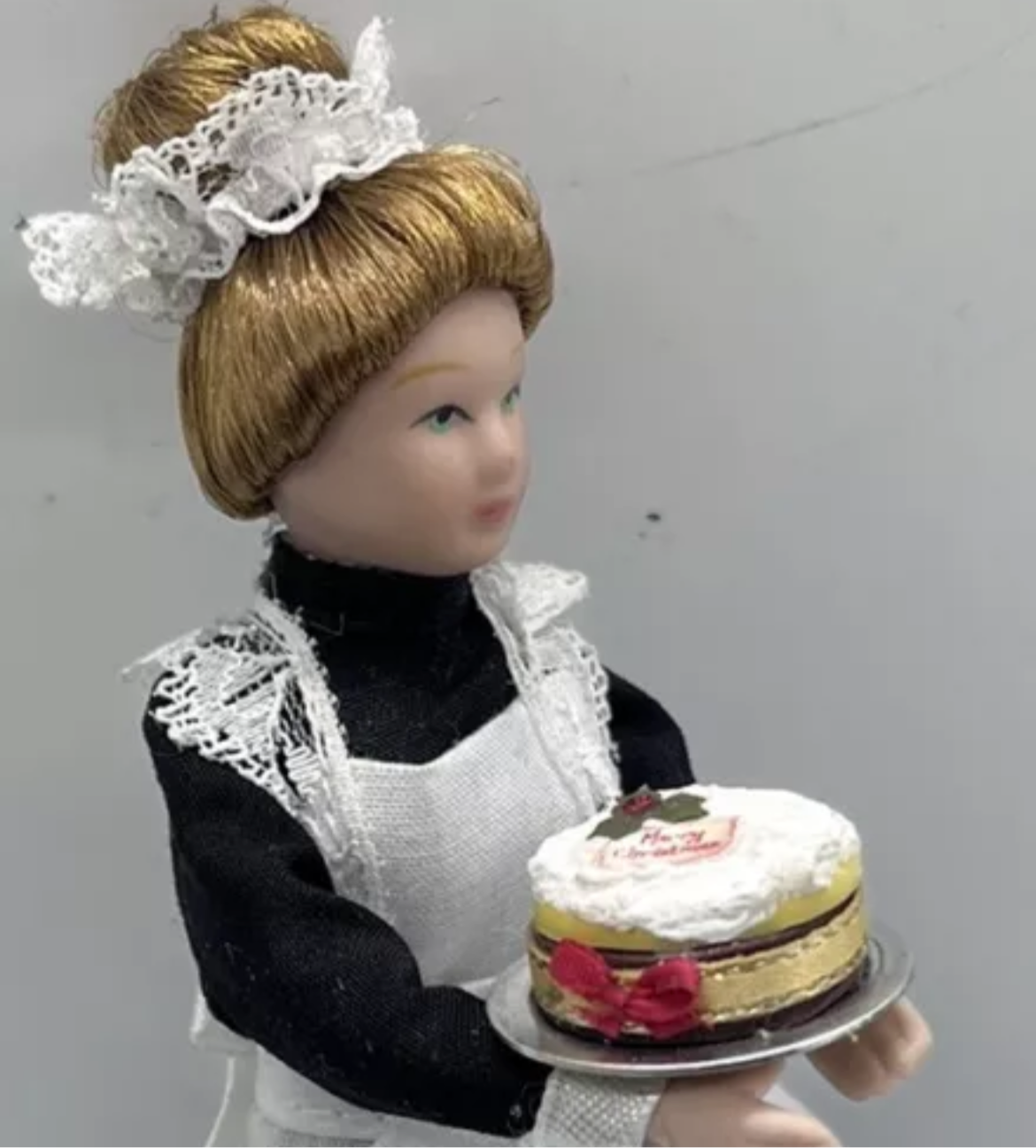 Dolls house Christmas cake on metal plate