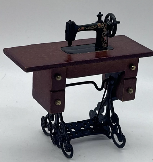Dolls house furniture sewing machine on table