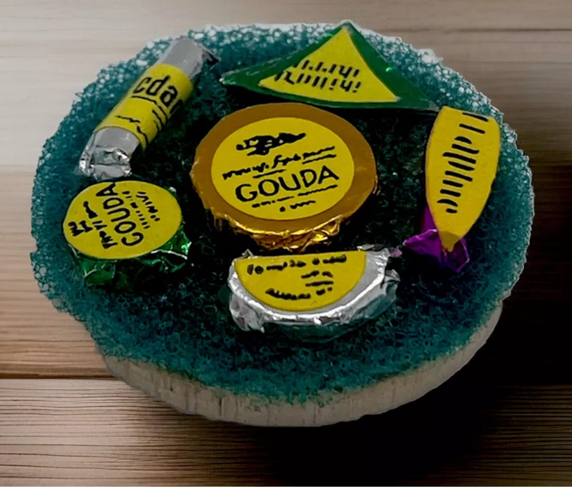 Dolls house cheese board all wrapped cheese