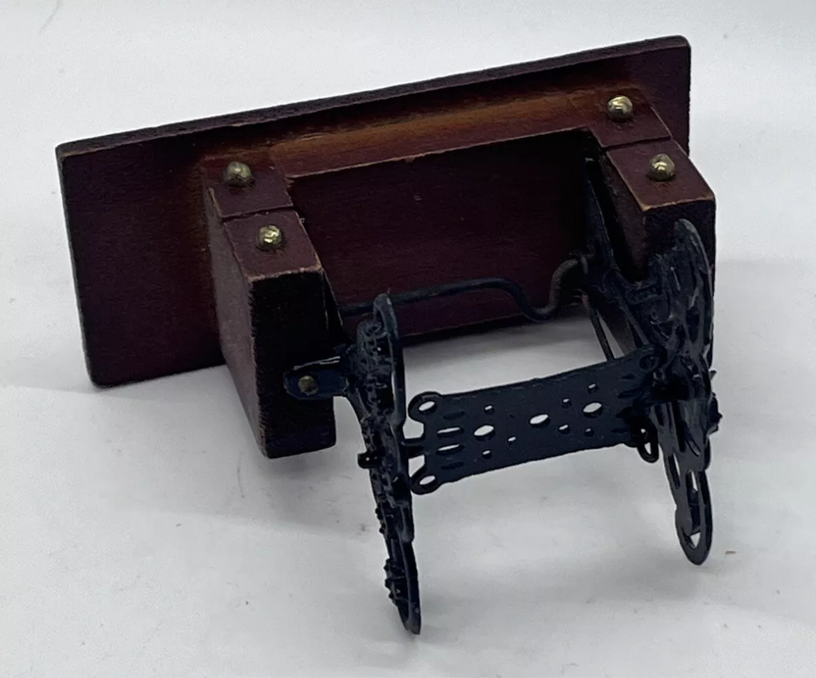Dolls house sewing machine on table