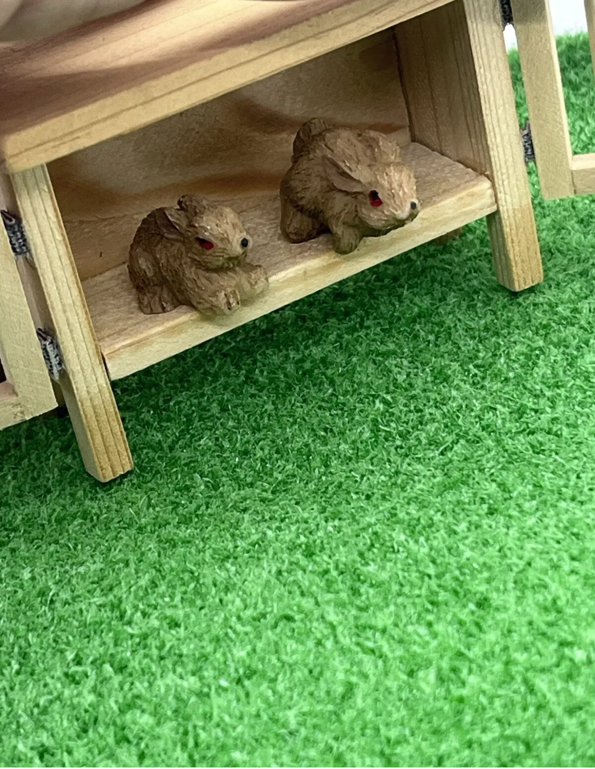 Dolls house hutch and 2 rabbits