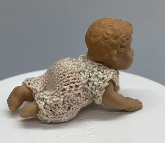 Dolls house baby with hand knitted romper