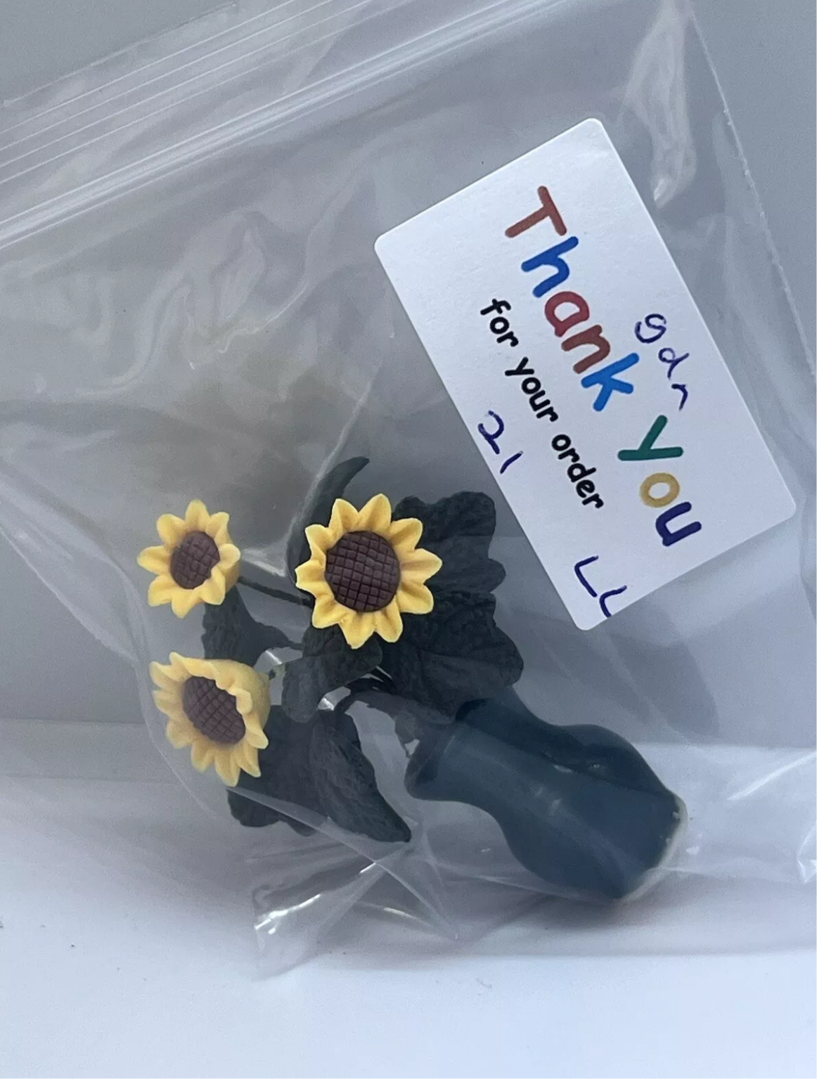 Dolls house sunflowers in vase