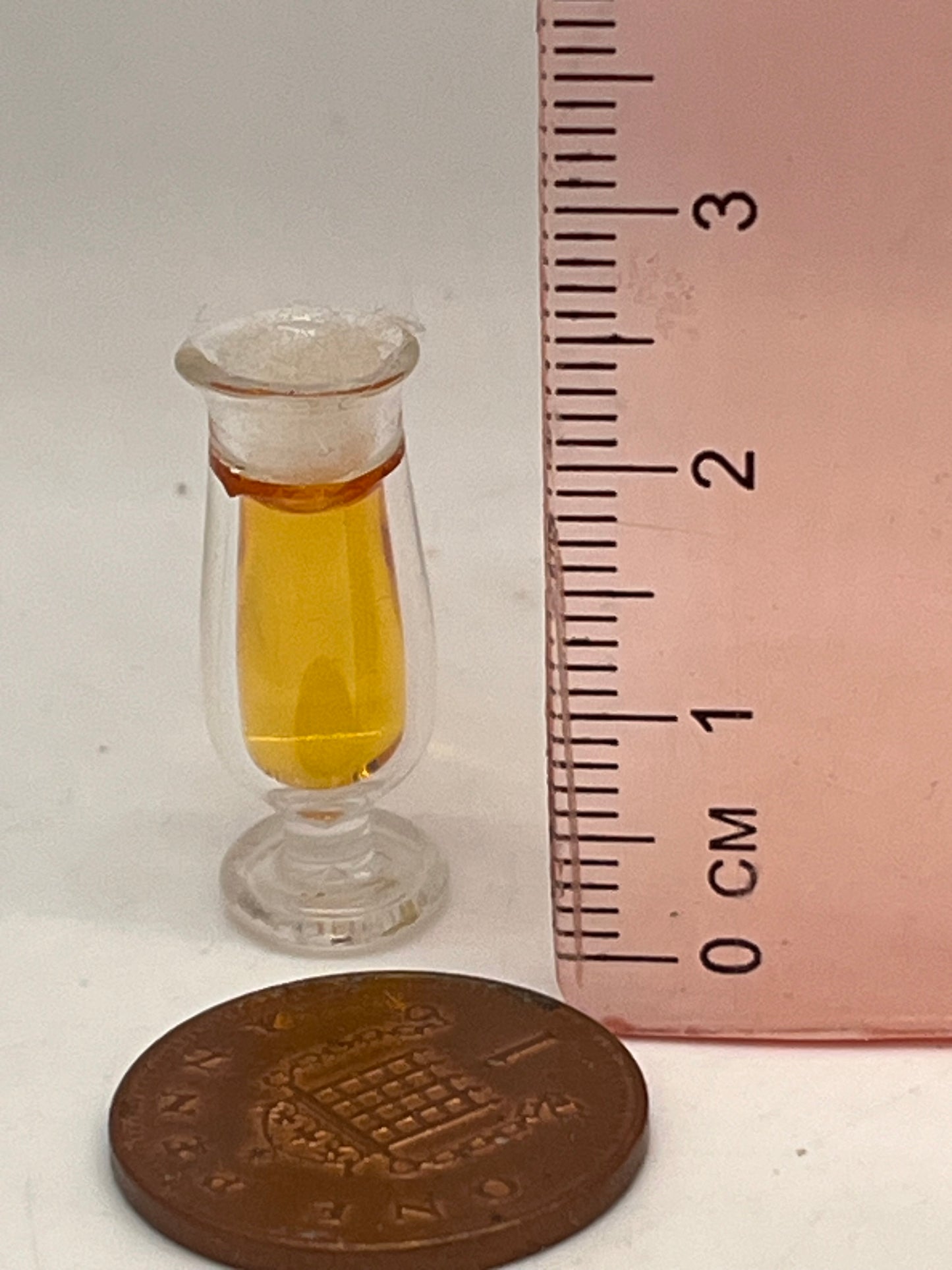 Dolls house beer in glass