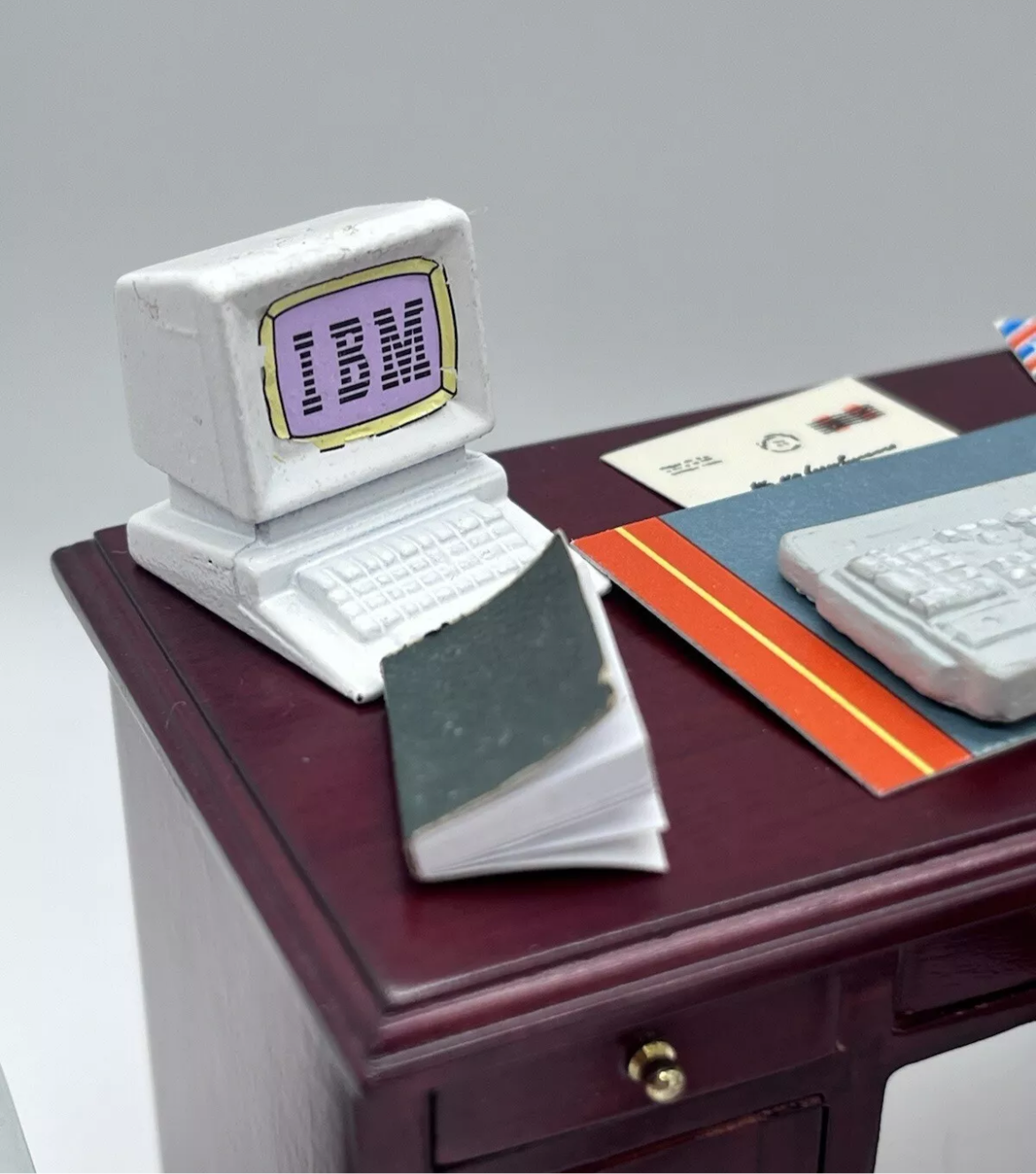 Dolls house desk, chair & all accessories.