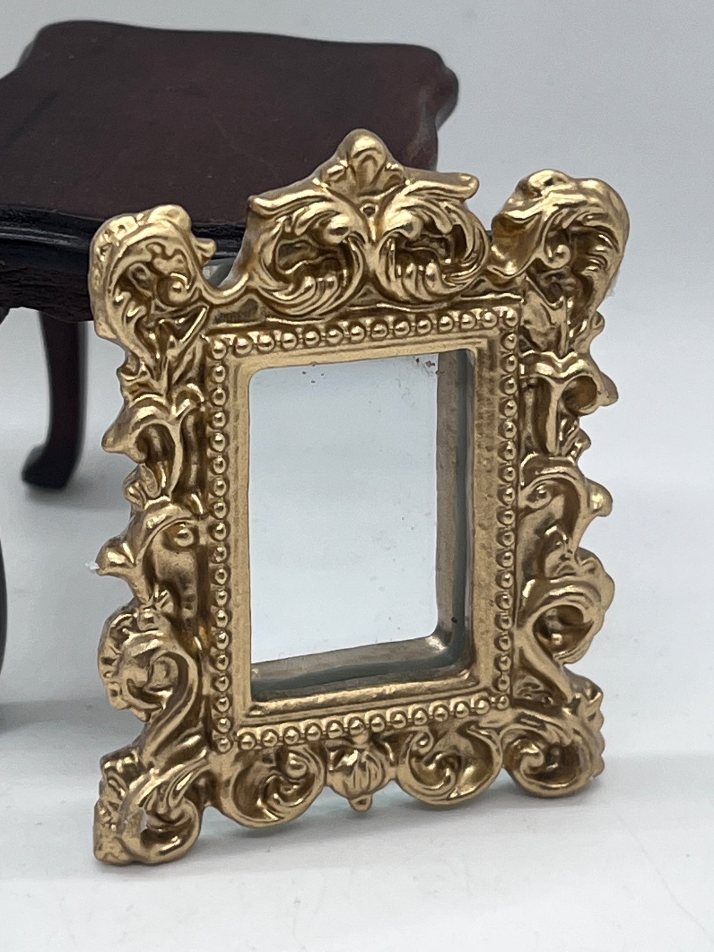 Dolls house metal framed ornate mirror