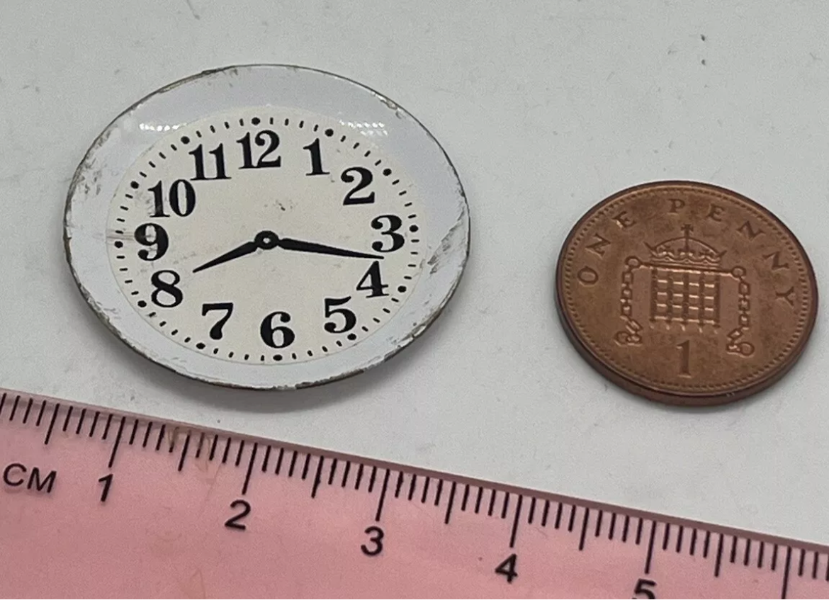 Dolls house metal plate marked
