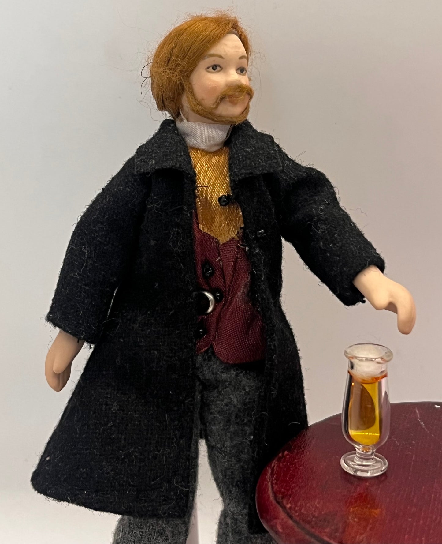 Dolls house beer in glass