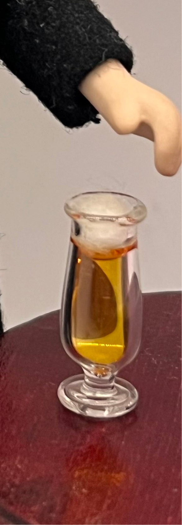 Dolls house beer in glass