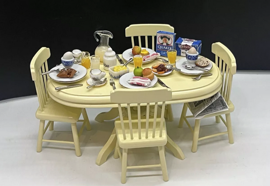 Dolls house dining table, set for breakfast