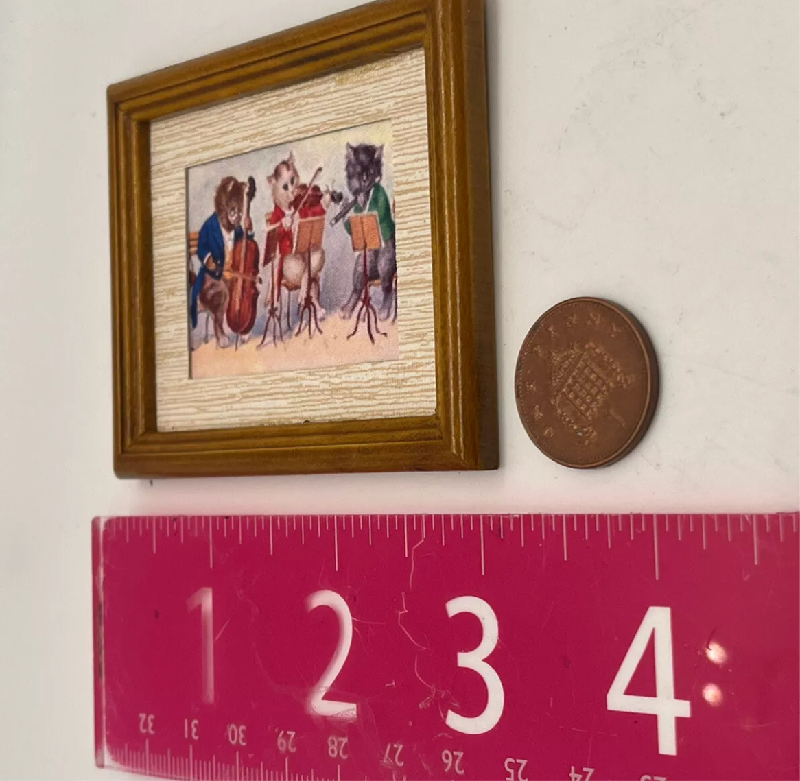 Dolls house cat and fiddle print, music room?
