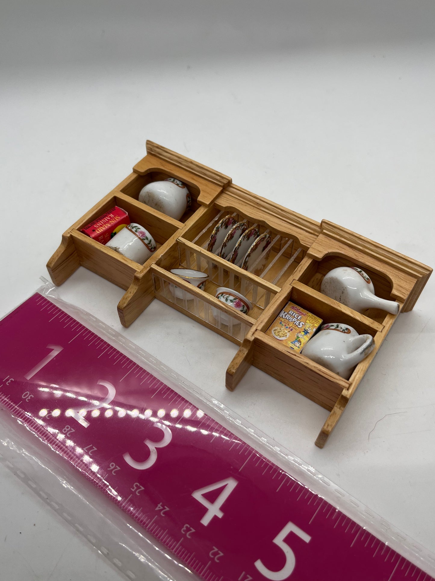 Dolls house filled wall unit