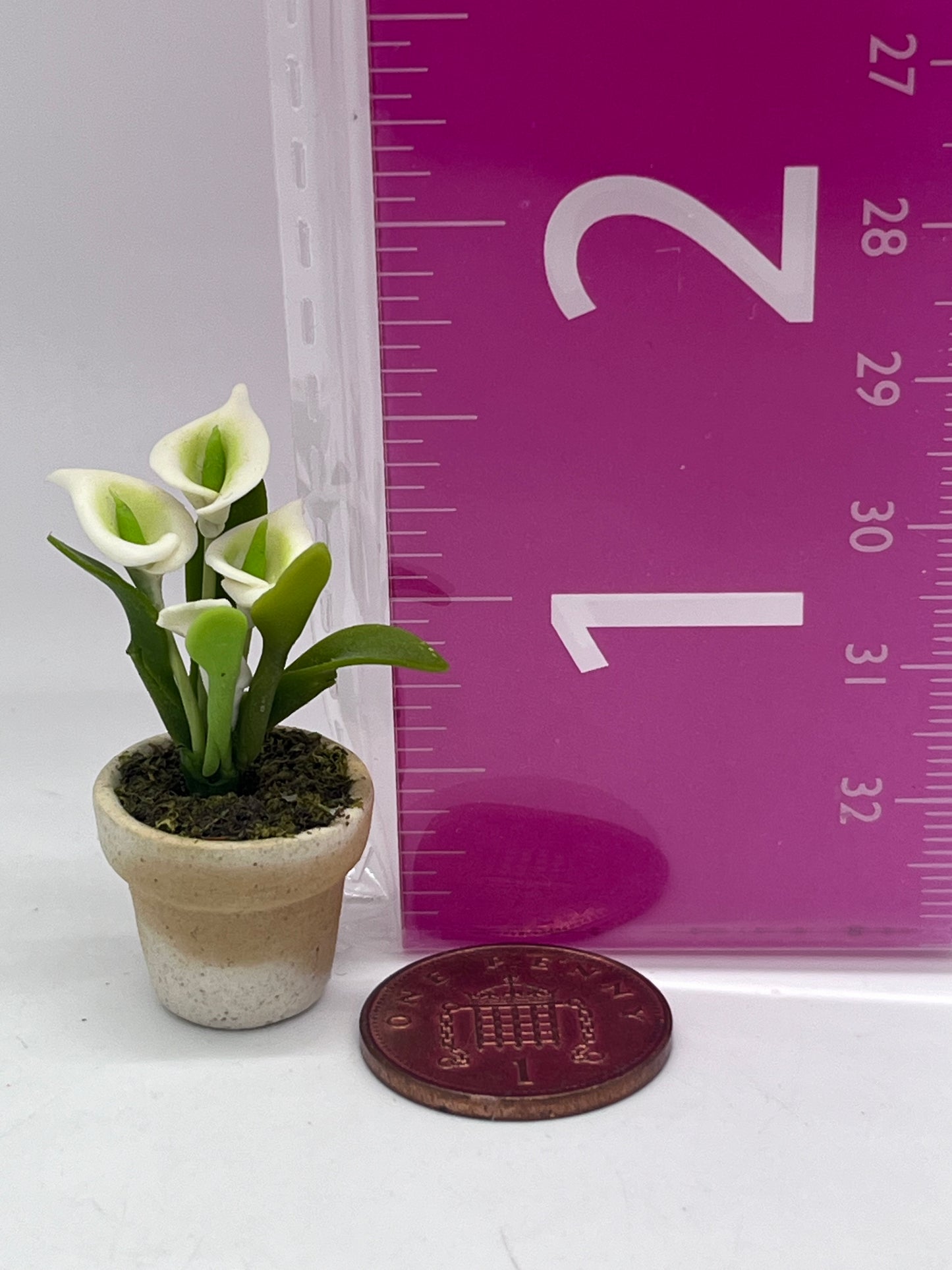Dolls house flowers in pot