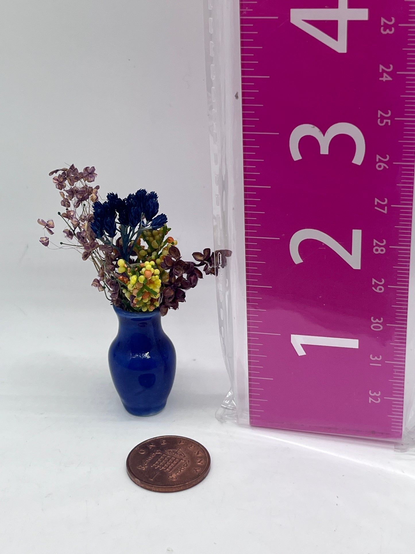 Dolls house flowers in ceramic vase